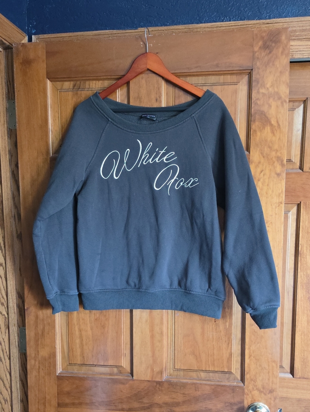 White Fox Boutique Black Pullover Sweatshirt with White Script Logo